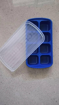 Compact mini silicone ice cube tray with a secure lid, perfect for crafting tiny ice cubes, chocolates, or soaps.