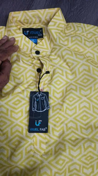 Men's Printed Spread Collar Casual Shirt Yellow with geometric prints and full sleeves in regular fit cotton blend fabric.