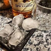 Detailed 3D skull-shaped silicone ice cube tray in a vibrant color, perfect for creating spooky, fun ice cubes for drinks.