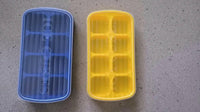 Mini silicone ice cube tray with a secure lid, perfect for crafting ice, chocolates, or candles in small, neat shapes.