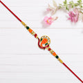 Golden Ganesha Rakhi With Red-green Beads And Stone Detailing saveolyf Fashion.
