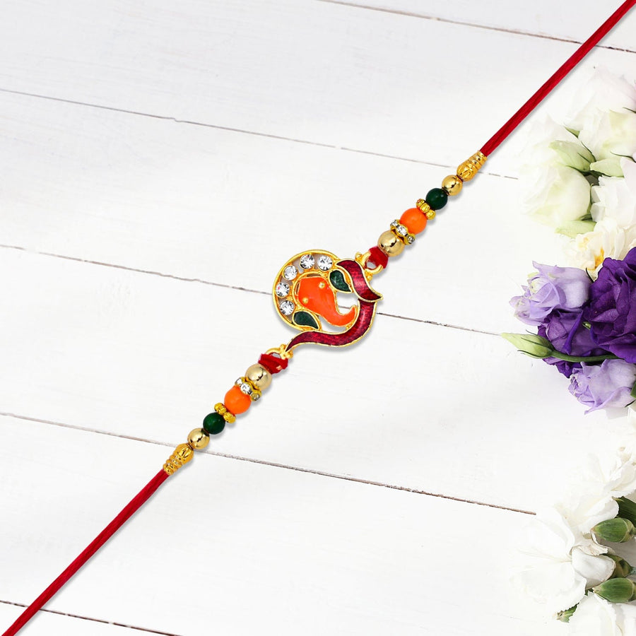 Golden Ganesha Rakhi With Red-green Beads And Stone Detailing saveolyf Fashion.