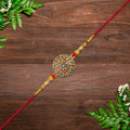 Royal Designer Rakhi With Kundan Centerpiece Red  Green Enamel Work And Golden Beads saveolyf Fashion.